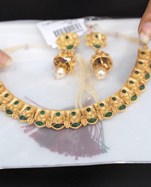 Necklace Set -Golden color and green color stones Search code 6107