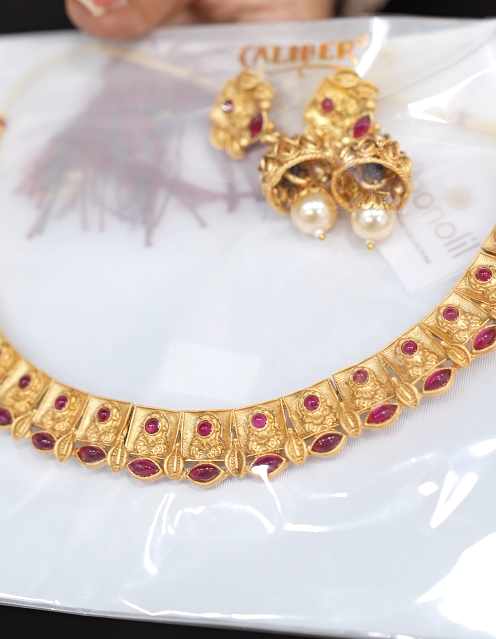 Necklace Set -Golden color and Red color stones Search code 6108