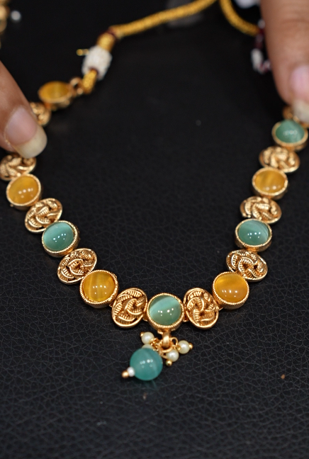 Necklace Set -Golden color and multi color stones Search code 6111