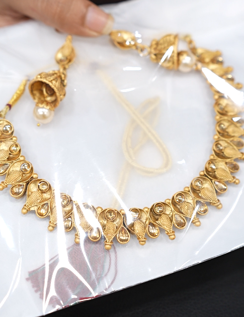 Necklace Set -Golden color and golden color stones Search code 6117