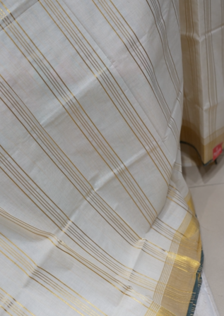 Vishu Special Saree -Golden shade Search code 9509