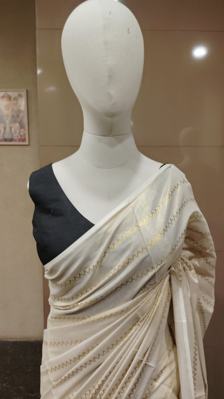 Set Mundu A pristine off-white or light cream base  Saree  Search code 9614