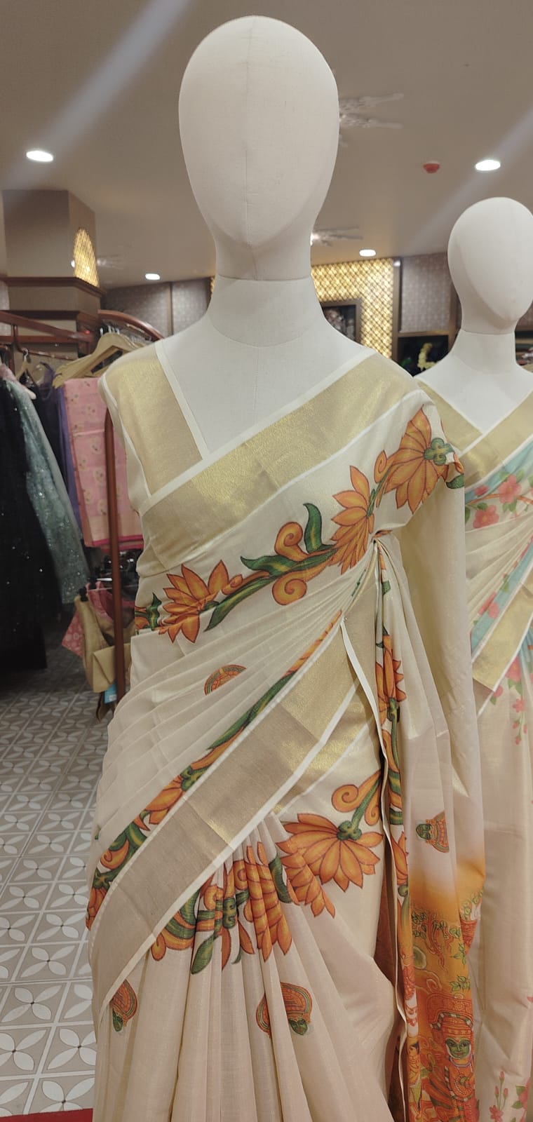 Cream Kerala Kasavu Saree with Hand-Painted Orange Floral Murals  Search code 7318
