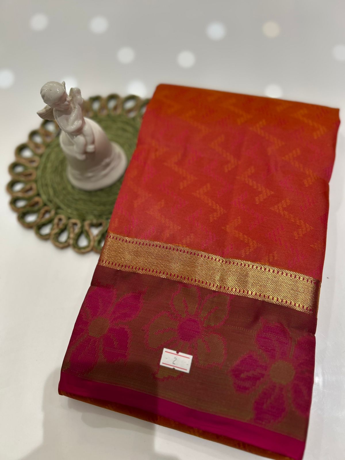kanchipuram self imposing saree-  Carrot peach  Search code 6010