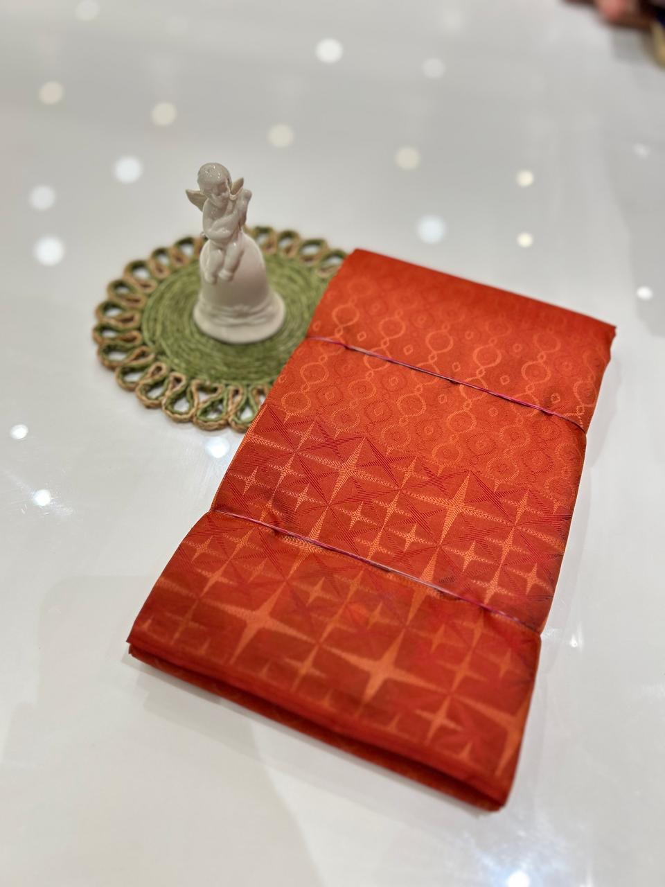 kanchipuram self imposing saree-Carrot peach   Search code 6037
